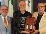 Massimo Cotto tra Maurizio Mela, a destra, e Giorgio Gianuzzi.